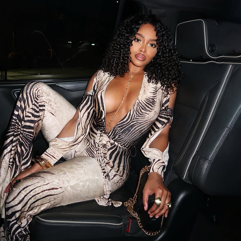 Plush Fashion Hub deep V plunge off-shoulder top paired with high waist bootcut pants jumpsuit, stylish and trendy outfit.