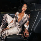 Plush Fashion Hub deep V plunge off-shoulder top paired with high waist bootcut pants jumpsuit, stylish and trendy outfit.