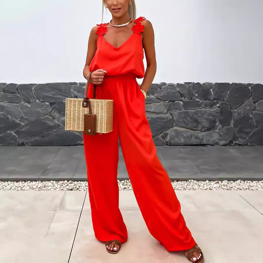 Plush Fashion Hub sleeveless jumpsuit with suspenders, pockets, casual loose fit for women, perfect for spring and summer wear.