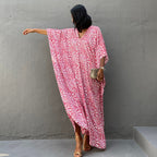 Printed plush fashion hub long beach cover-up dress with sun protection, perfect for vacation or swimming pool outings.