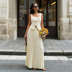 Elegant beige pleated skirt and matching top from Bella Mia summer two-piece set, stylish and flowy women's bottoms.