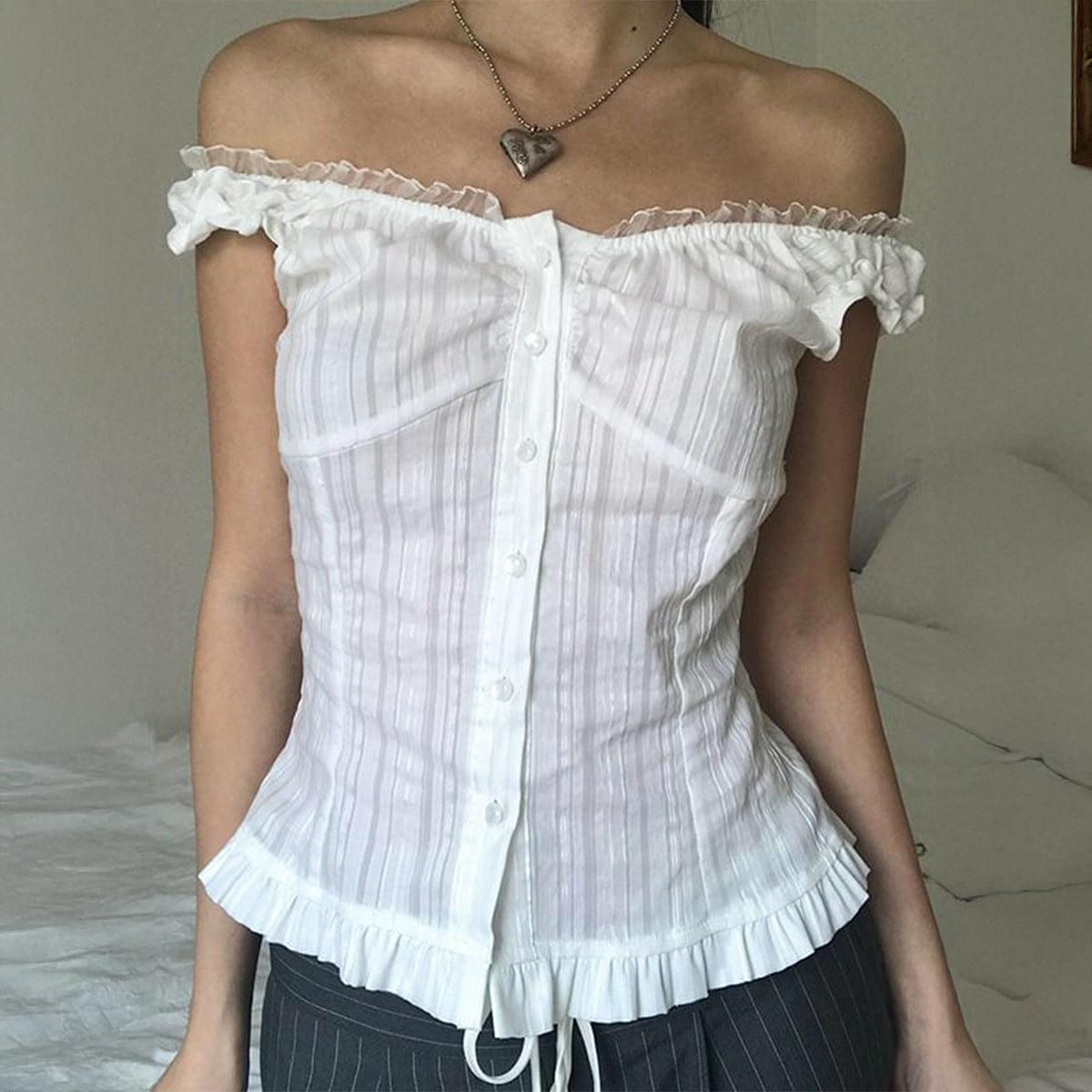Women’s summer sleeveless cold shoulder cardigan shirt by Bella Mia, featuring a trendy, lightweight design perfect for warm weather.