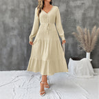 Elegant Bella Mia long sleeve pleated V-neck dress in solid color, perfect for autumn, shown on a model.