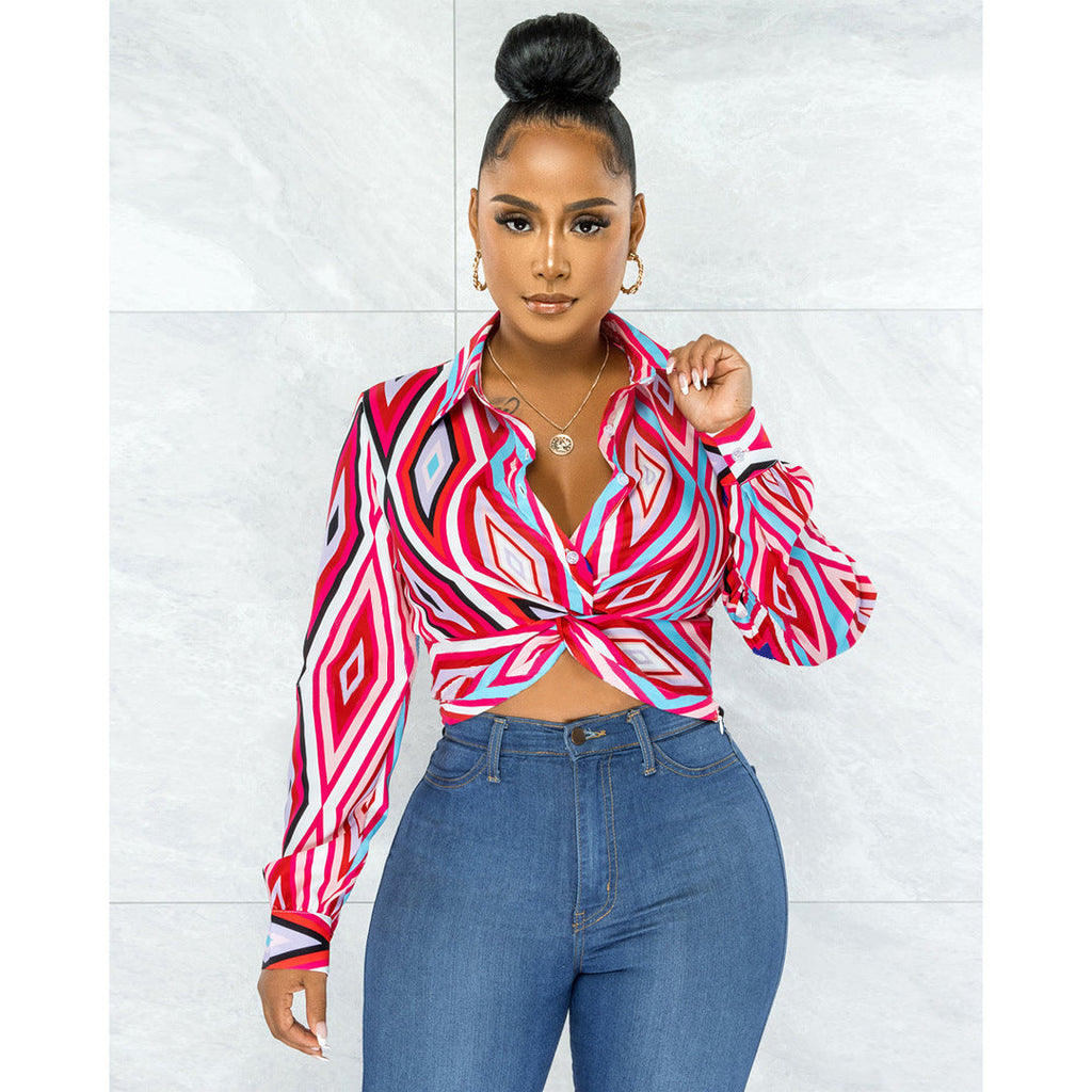 Women’s Bella Mia twist button shirt top with geometric pattern print, featuring a stylish design and button details.