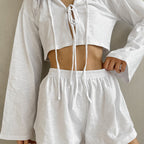 White cotton cardigan and lace-up long sleeve pajamas set from Bella Mia, casual two-piece ladies homewear with shorts.