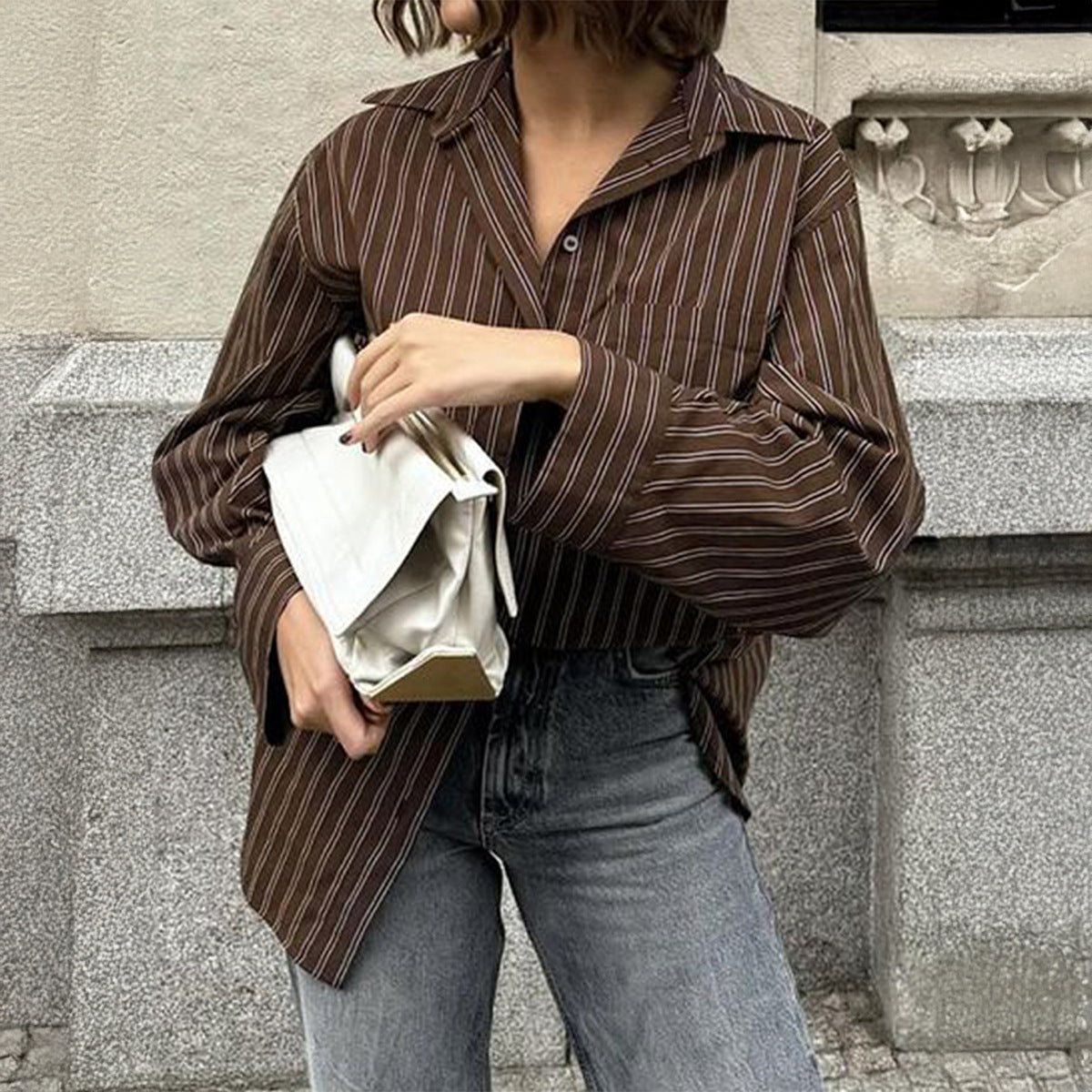 Women’s plaid long sleeve coat shirt by Plush Fashion Hub, casual autumn vacation style with button-up front and plaid pattern.
