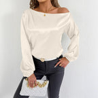 White satin long sleeve shirt for women, stylish summer top by Bella Mia, elegant and lightweight for warm weather.