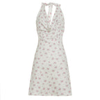Metallic glossy sleeveless halter dress with swing collar and backless sheath design from Bella Mia, featuring a sexy, form-fitting silhouette.