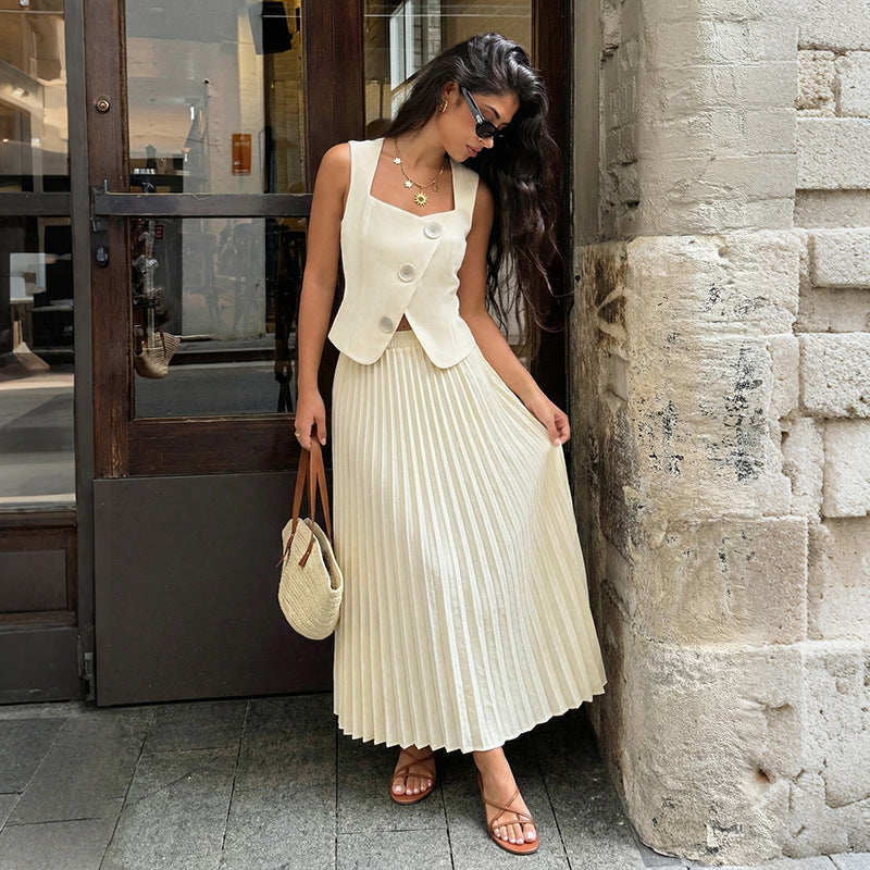 Elegant summer pleated skirt and two-piece set for women, featuring a flowy design and stylish details from Plush Fashion Hub.