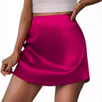 Bella Mia satin mini A-line pleated skirt with high waist, stylish women's bottoms showcasing smooth satin fabric and flattering fit.
