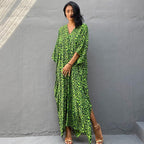 Printed long beach cover-up skirt by Plush Fashion Hub, featuring a maxi dress design with sun protection and stylish swimwear cover.