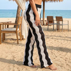 Black and white striped women's casual beach pants with contrast patchwork, cutout details, and hollow out design by Plush Fashion Hub.