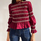 Multi-color Bella Mia long-sleeved casual top with high collar, smocking details, perfect for autumn and winter wear.