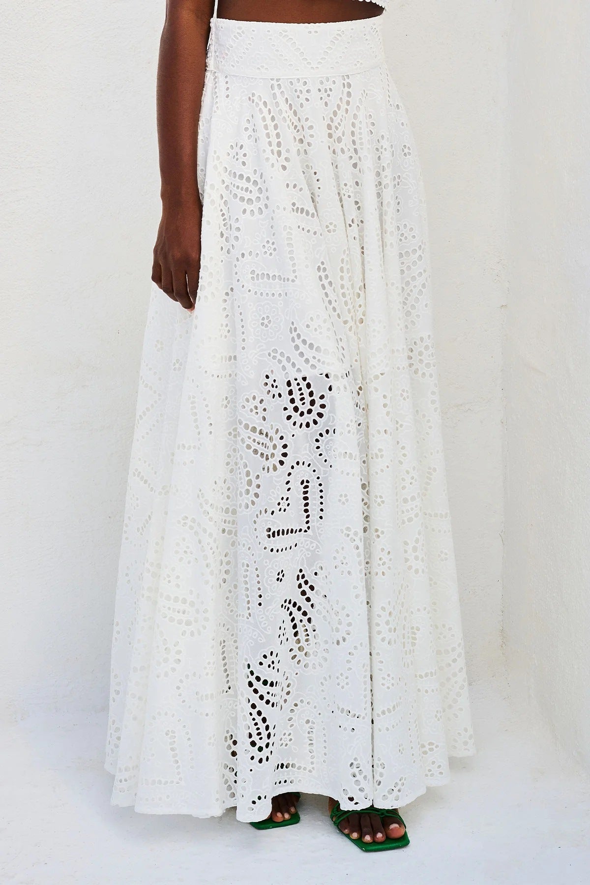 Casual women's sleeveless long skirt and top matching set with pockets, perfect for spring and summer vacation wear.
