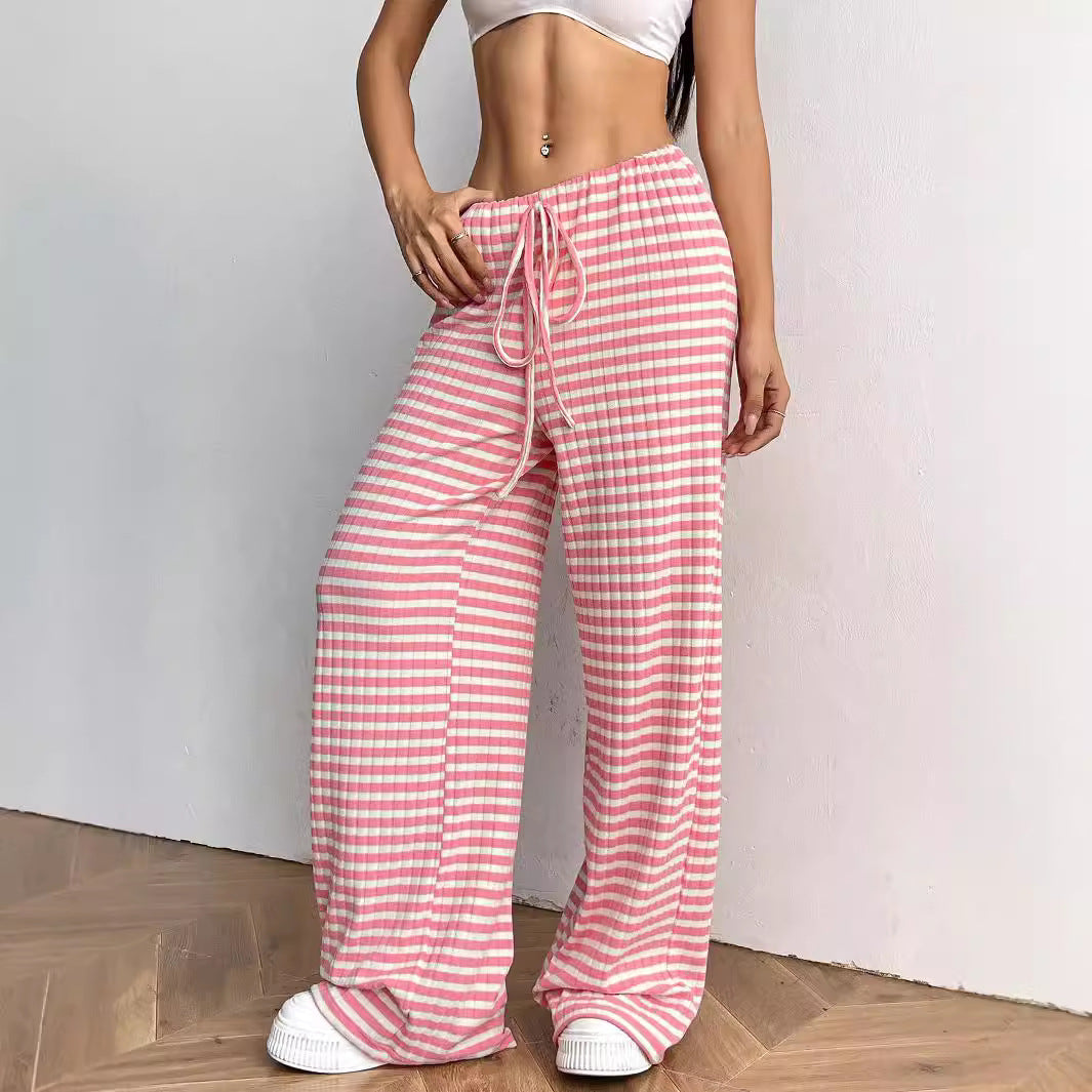 Women’s casual striped straight-leg pants with rubber band waist and drawstring, in solid color for autumn and winter.