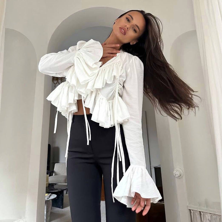 Women’s spring ruffled flare sleeve tie-neck top by Plush Fashion Hub, featuring stylish design and matching shirt style.