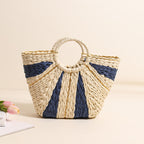 Large capacity straw-weaved Bella Mia bag with contrast handles, perfect for beach, vacation, or casual carrying.