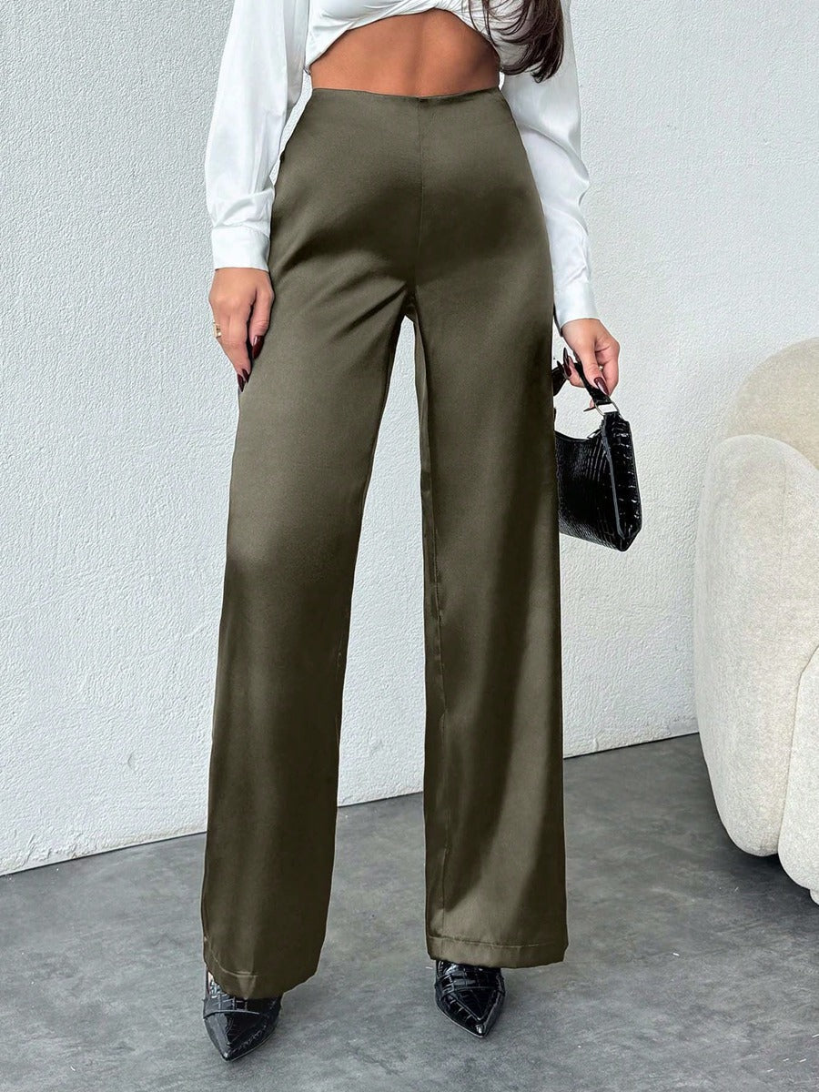 Women’s black satin wide-leg casual pants by Bella Mia, loose autumn bottoms with a relaxed fit and stylish satin finish.