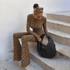 Leopard print long sleeve jumpsuit for women with high waist, round neck, and backless design, by Plush Fashion Hub.