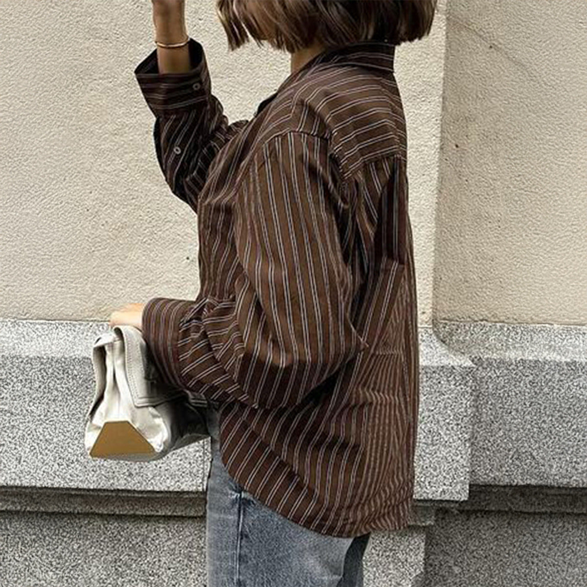 Women’s plaid long sleeve coat shirt by Plush Fashion Hub, casual autumn vacation style, shown in a front view with collar and button details.