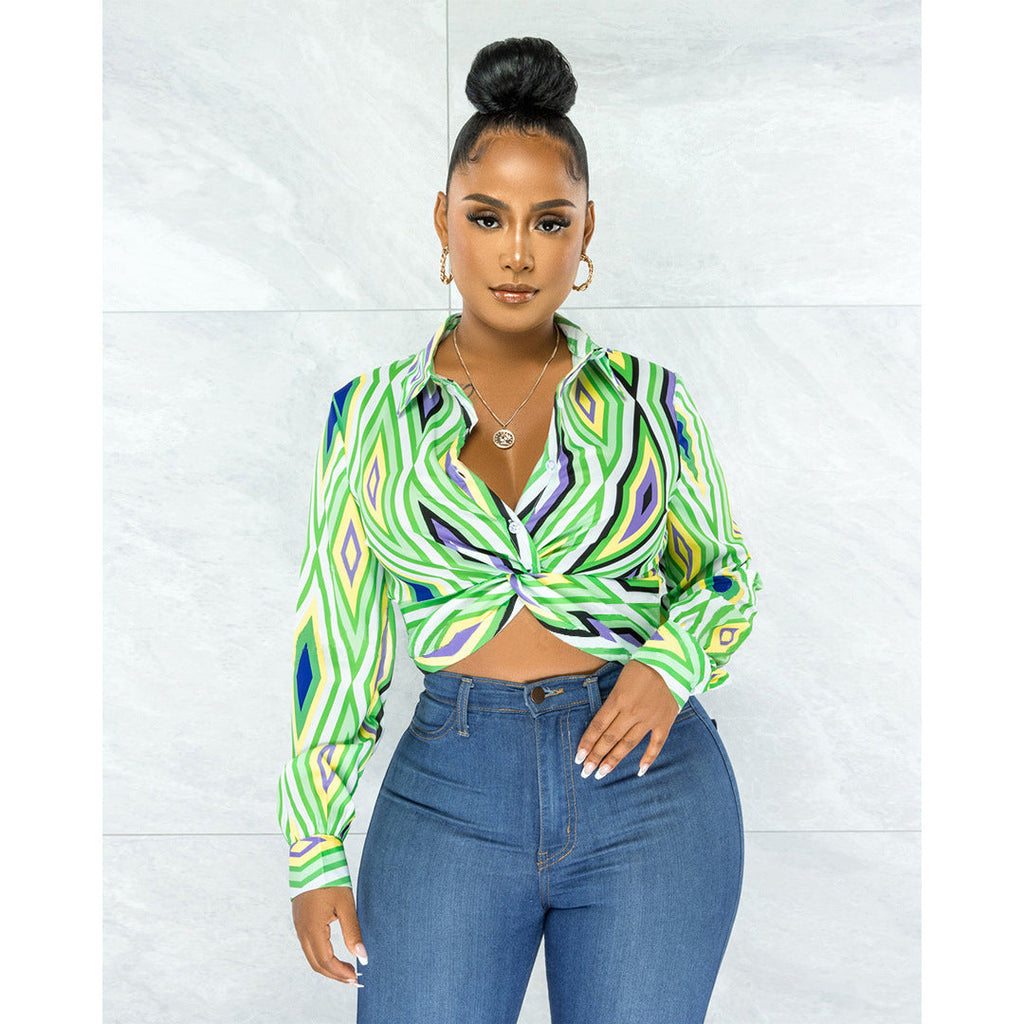 Women’s Bella Mia twist button shirt top with geometric pattern print, featuring a stylish collar and long sleeves.