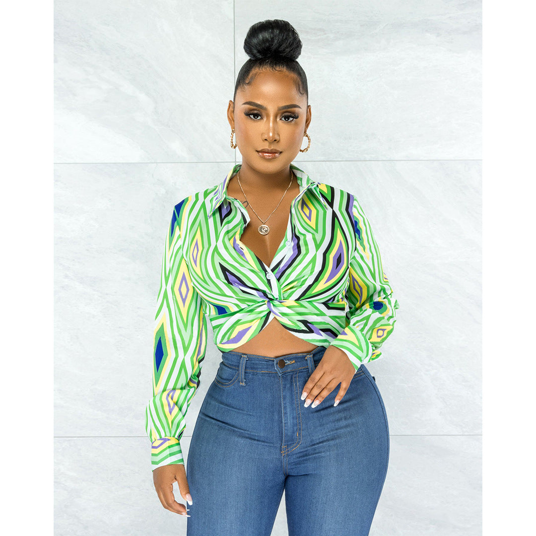 Women’s Bella Mia twist button shirt top with geometric pattern print, featuring a stylish collar and long sleeves.
