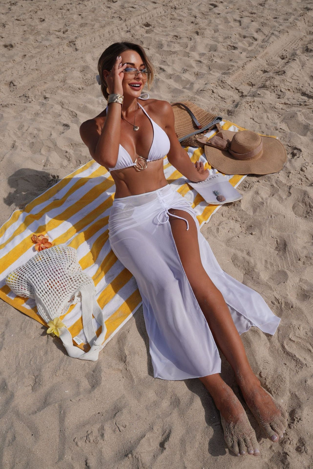 Solid color beach sun protection tulle skirt bottoms from Plush Fashion Hub, part of a three-piece bikini swimsuit set.