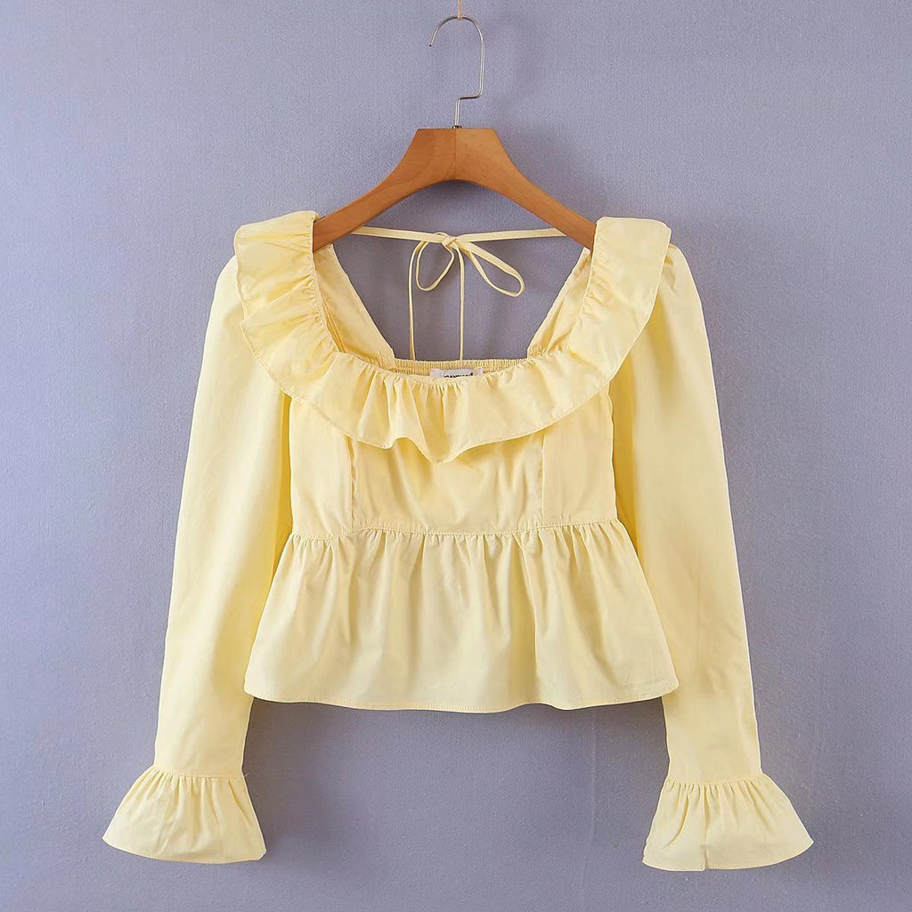 Bella Mia Summer Wind women’s long sleeve ruffled shirt in solid color, stylish top with feminine ruffle details.