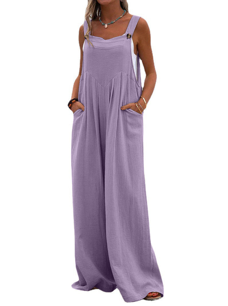 Women’s summer jumpsuit by Bella Mia featuring a solid color, ethnic print, wide-leg design, perfect for warm weather wear.