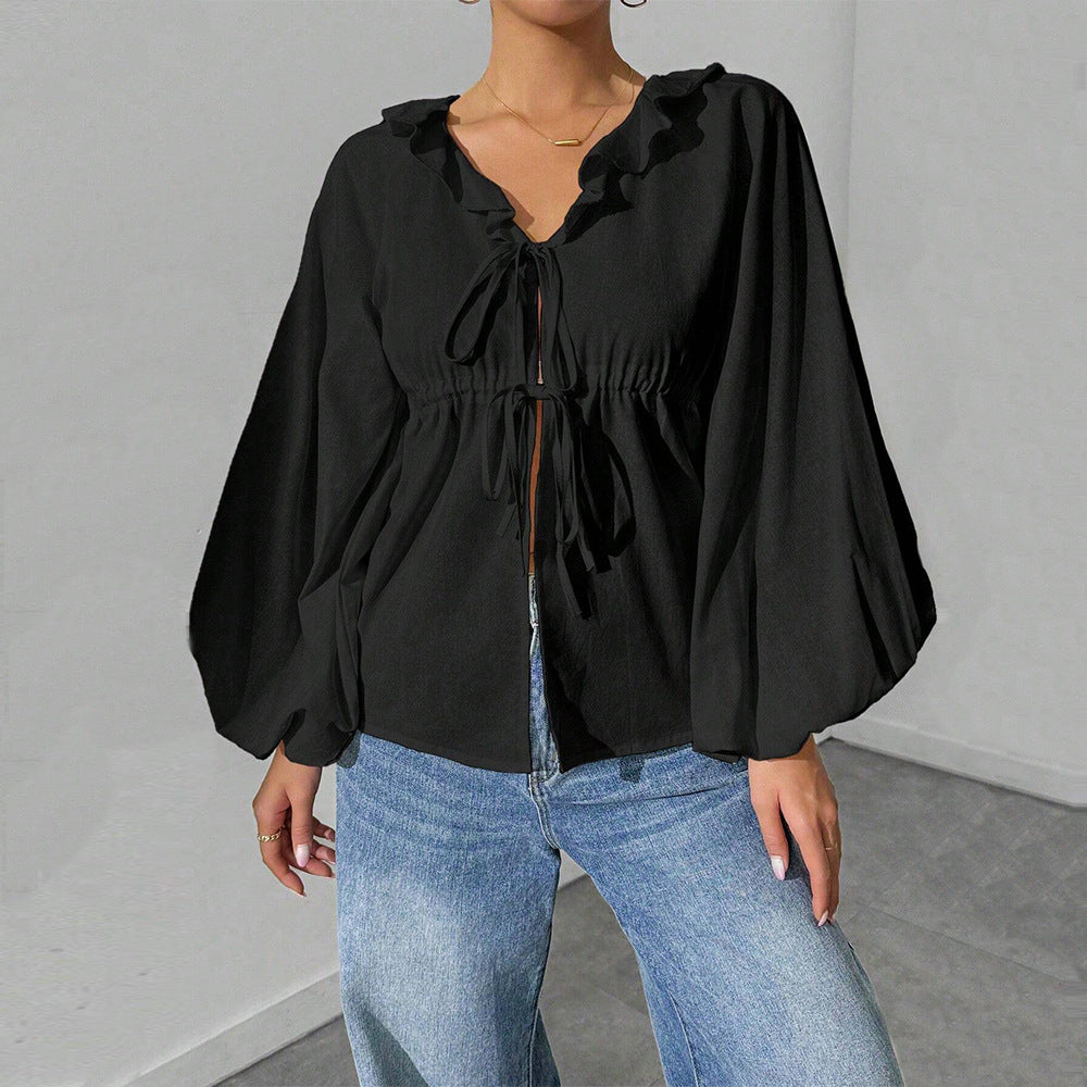 Women’s loose batwing sleeve cardigan top by Bella Mia, in a simple, stylish autumn-winter T-shirt design with a big swing fit.