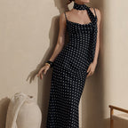 Polka dot strap maxi dress by Plush Fashion Hub featuring halter neck, fishtail design, perfect for summer occasions