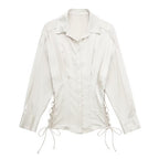 Autumn women’s satin long sleeve lace-up slim fit shirt by Bella Mia, shown in a stylish close-up image.