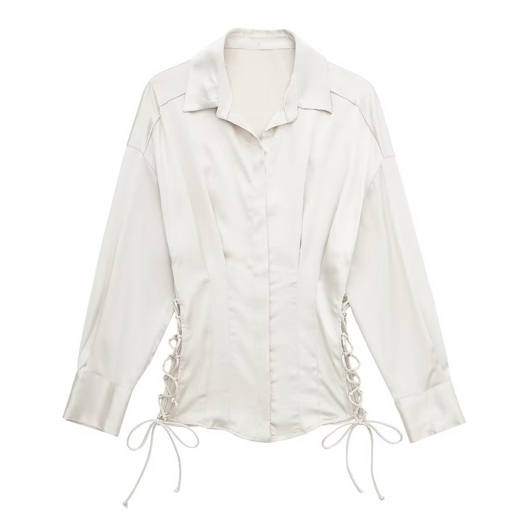 Autumn women’s satin long sleeve lace-up slim fit shirt by Bella Mia, shown in a stylish close-up image.