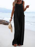 Women’s summer jumpsuit by Bella Mia featuring a solid color, ethnic print, wide-leg design, perfect for warm weather.