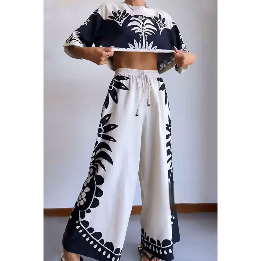 Casual women's spring summer two-piece short sleeve suit with elastic waist, loose fit, in a matching set from Plush Fashion Hub.