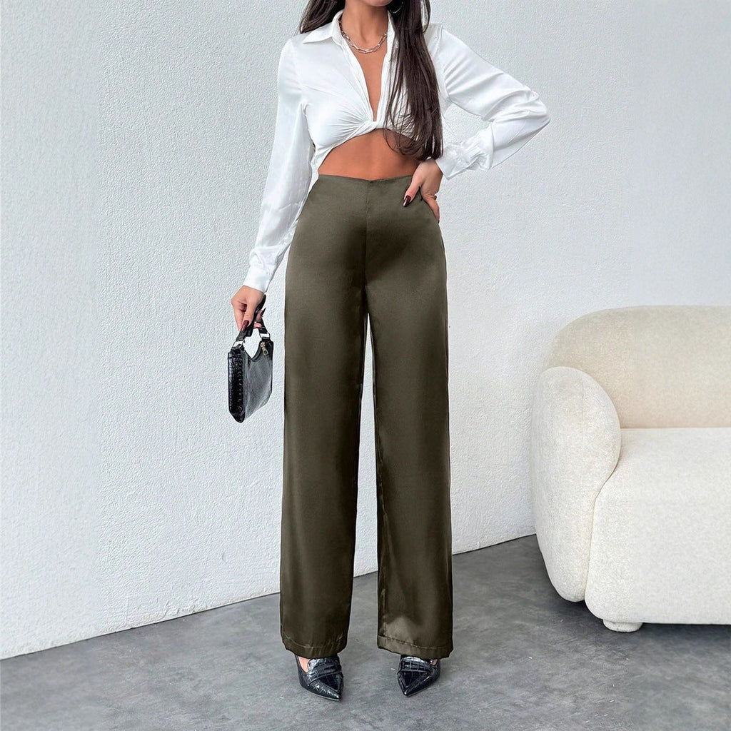 Women’s black satin wide-leg casual pants from Bella Mia, loose fit autumn satin bottoms with a relaxed, stylish silhouette.