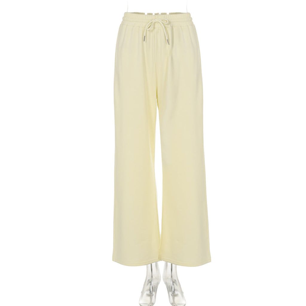 Close-up of Bella Mia women's casual loose drawstring trousers in solid color, showcasing the tight waist and relaxed fit.