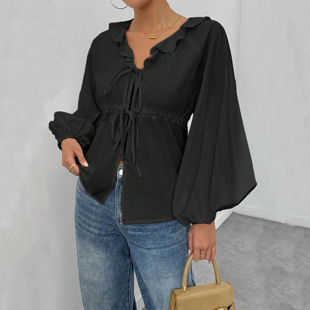 Women’s loose batwing sleeve cardigan top by Bella Mia, autumn winter casual T-shirt with a relaxed fit and simple style.