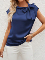 Bella Mia satin women's T-shirt with half-open collar and bow detail, featuring a special interest design.