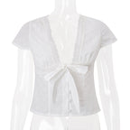 Women’s summer V-neck bow bandage short sleeve T-shirt top by Bella Mia, featuring a sexy, fitted design and stylish details.