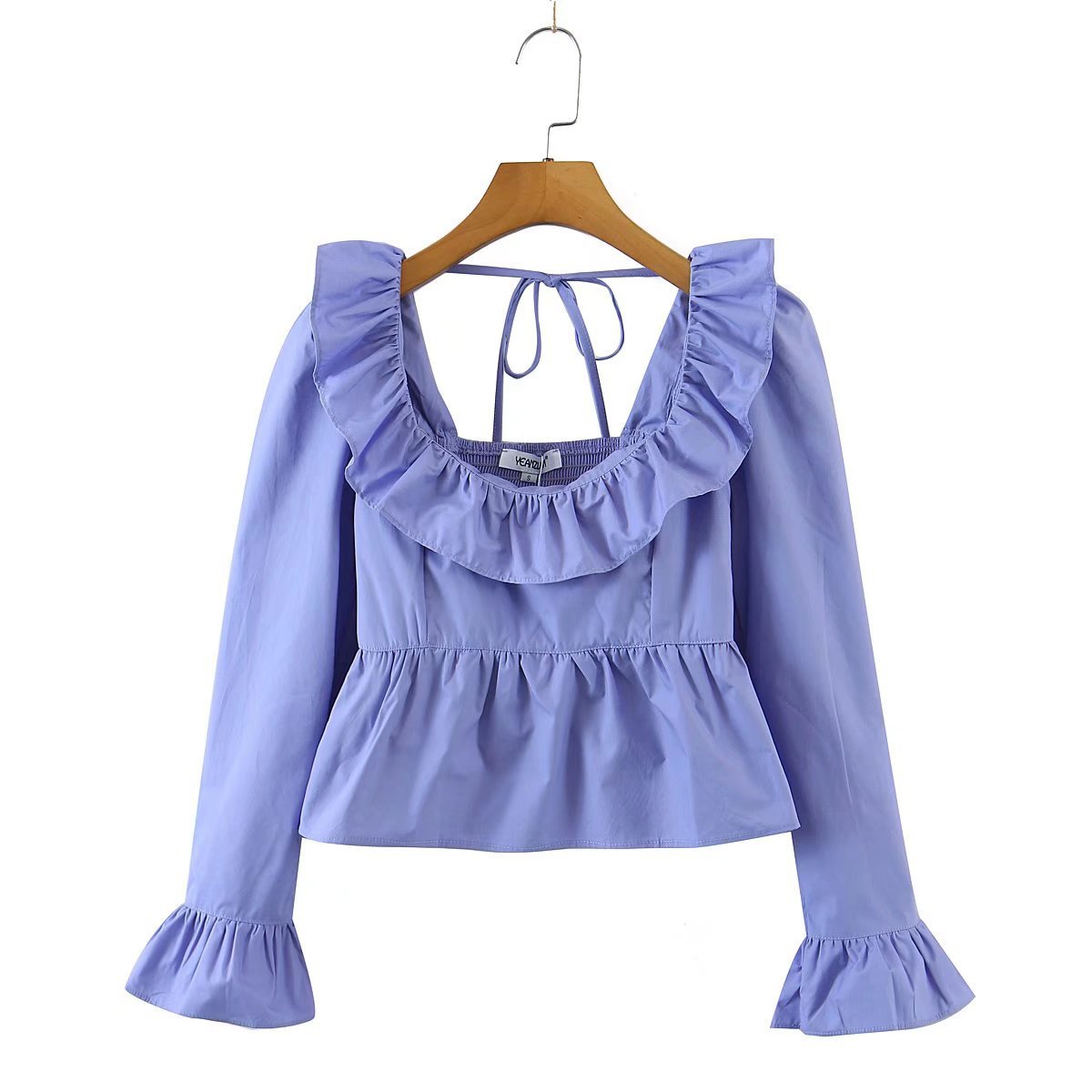 Bella Mia Summer Wind solid color long sleeve ruffled shirt, stylish women’s tops with feminine design and lightweight fabric.
