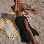 Solid color beach sun protection tulle skirt bottoms from Plush Fashion Hub, part of a three-piece bikini swimsuit set.