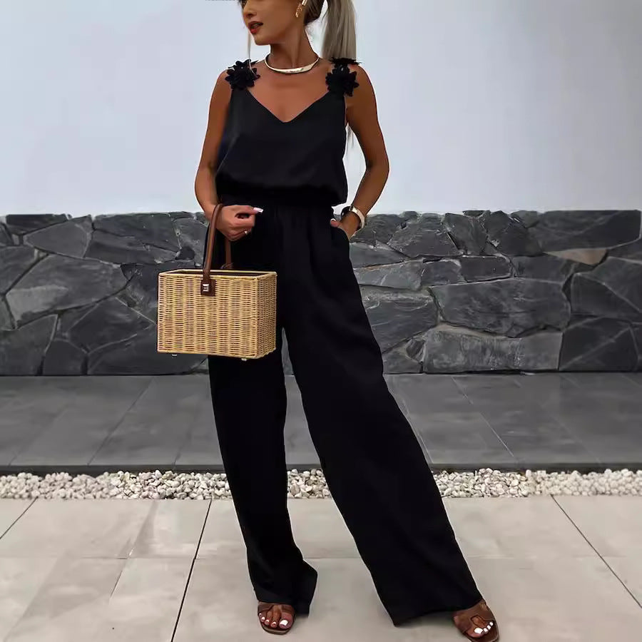 Casual sleeveless jumpsuit with suspenders, pockets, and loose fit for women, by Plush Fashion Hub, perfect for spring and summer wear.