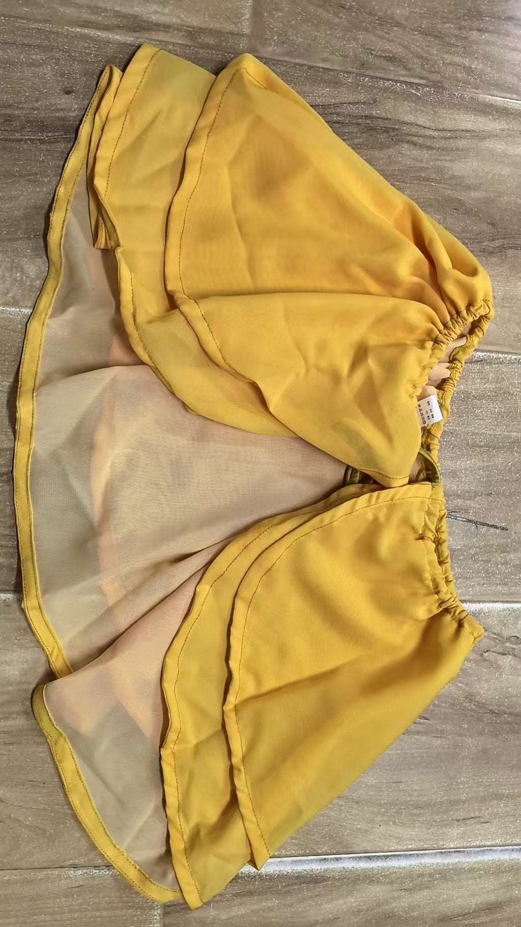 Solid color bikini short skirt three-piece set for women featuring a sexy triangle bikini bottom, stylish and vibrant swimwear.