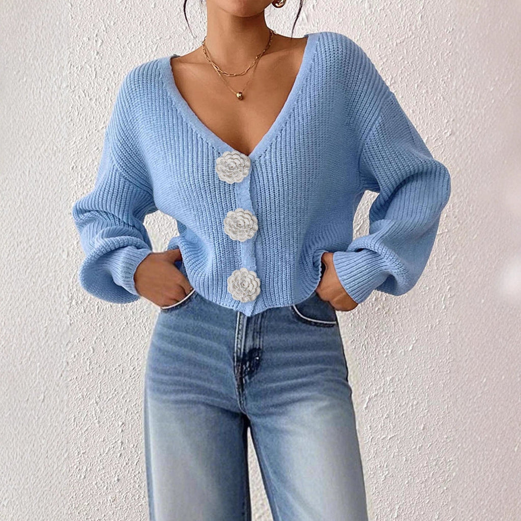 Women’s knitted floral cardigan by Bella Mia featuring decorative buttons, short length, and hand-hook design, ideal as a stylish top.