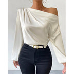 Bella Mia women's satin long sleeve top featuring oblique shoulder design and asymmetric pullover style in solid color.
