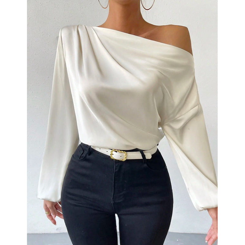 Bella Mia women's satin long sleeve top featuring oblique shoulder design and asymmetric pullover style in solid color.
