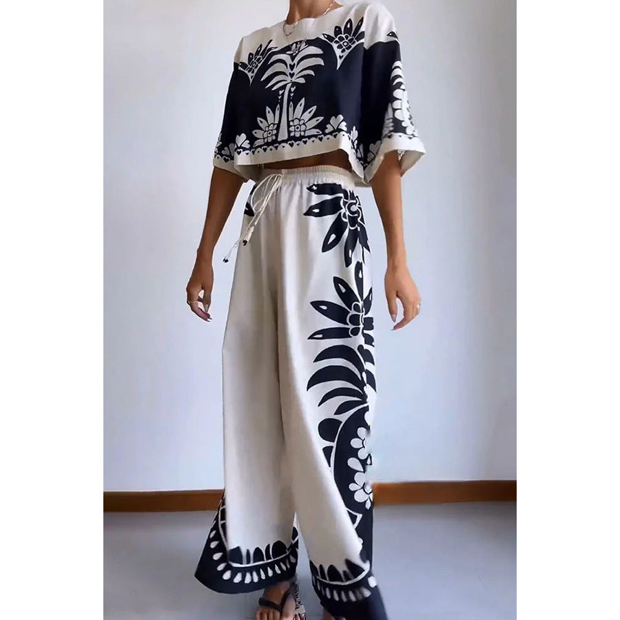 Casual women's spring summer short sleeve suit set with elastic waist, loose fit, two-piece matching outfit by Plush Fashion Hub.