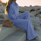 Women’s striped collared long sleeve short shirt and loose wide-leg pants two-piece set by Bella Mia, stylish and comfortable outfit.