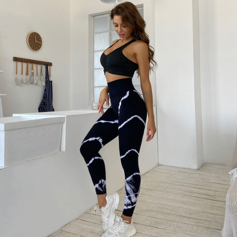 Bella Mia high top sports yoga pants with tie-dye design, moisture-wicking, quick-drying, ankle length, and hip-lifting fit.